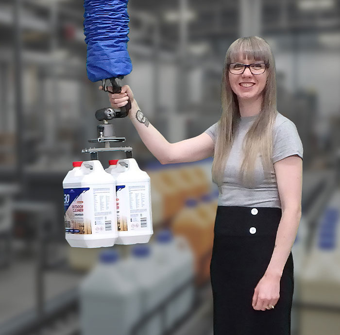 Vacuum lifter gripping and lifting a sealed container
